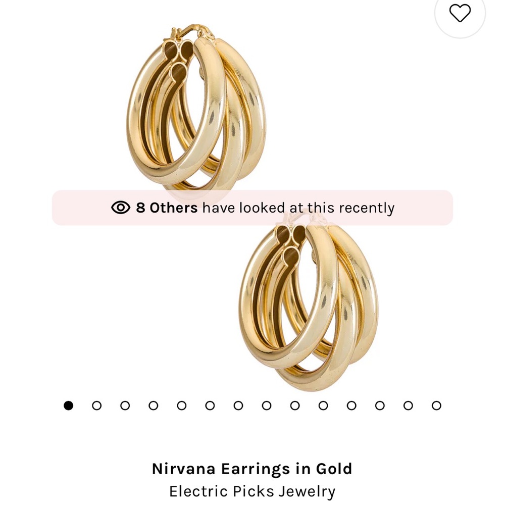 Electric picks never worn earrings. Currently selling for $57
